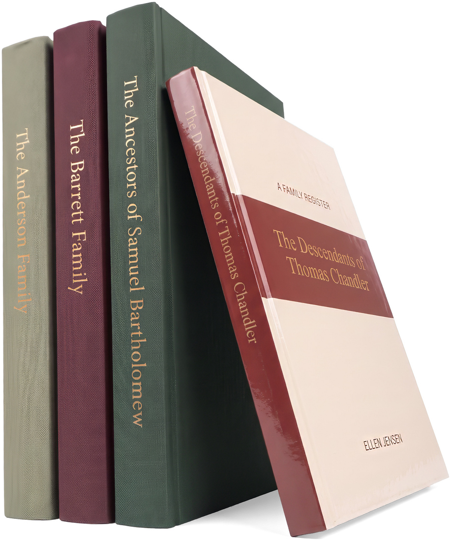 Family history books beside an open family register and old photographs
